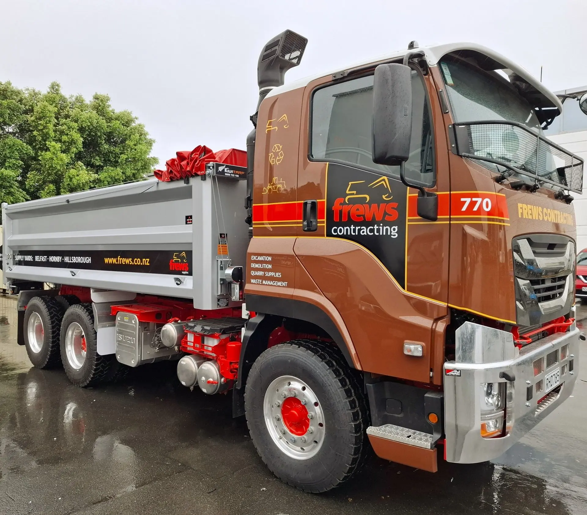 Cab and truck bed wrap with logo on Frews truck
