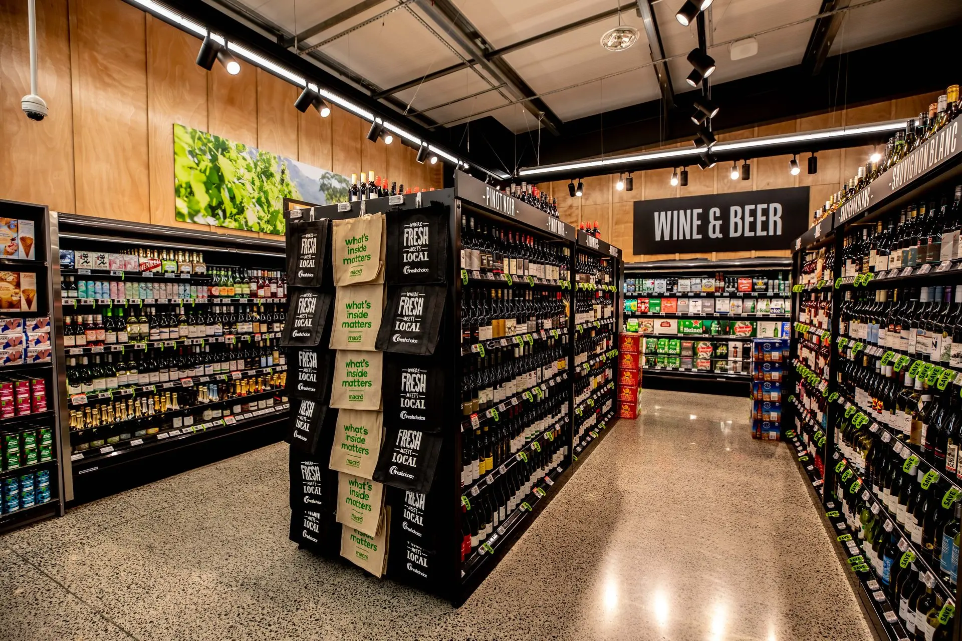 Custom Aisle signage helps with customer navigate and can be used for informative purposes.