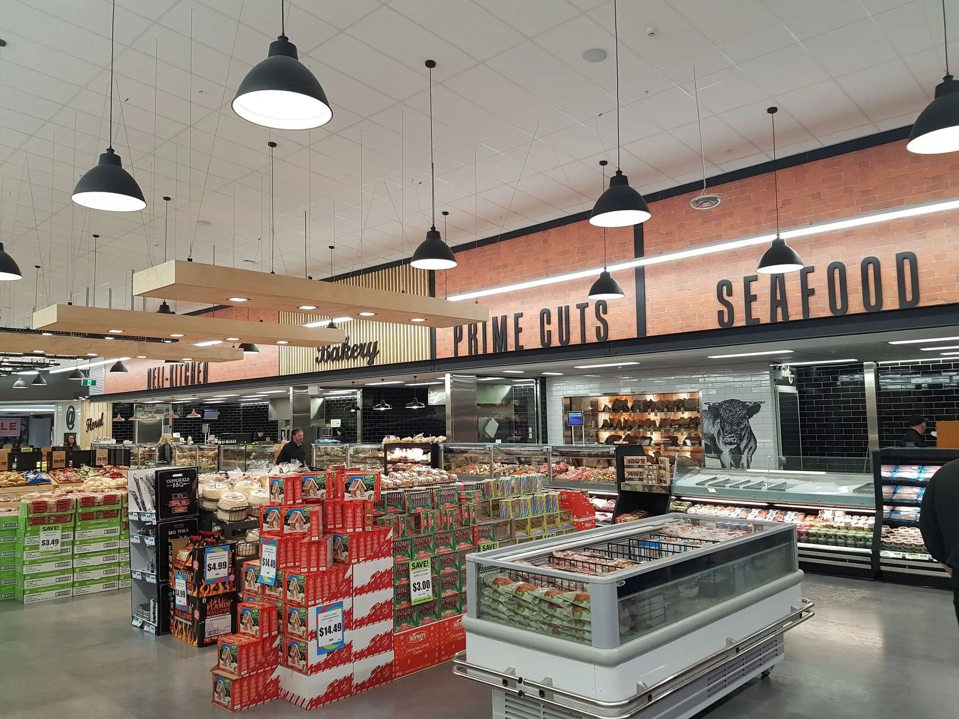 Large scale store signage helps customers navigate with ease to find what they are looking for.