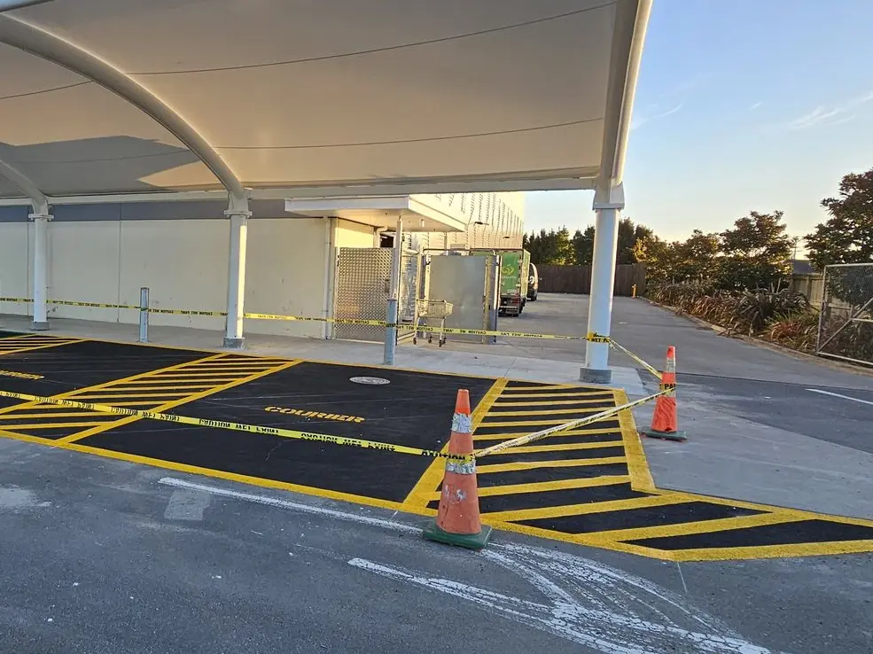 Walkway anti slip line marking at Woolworths supermarket