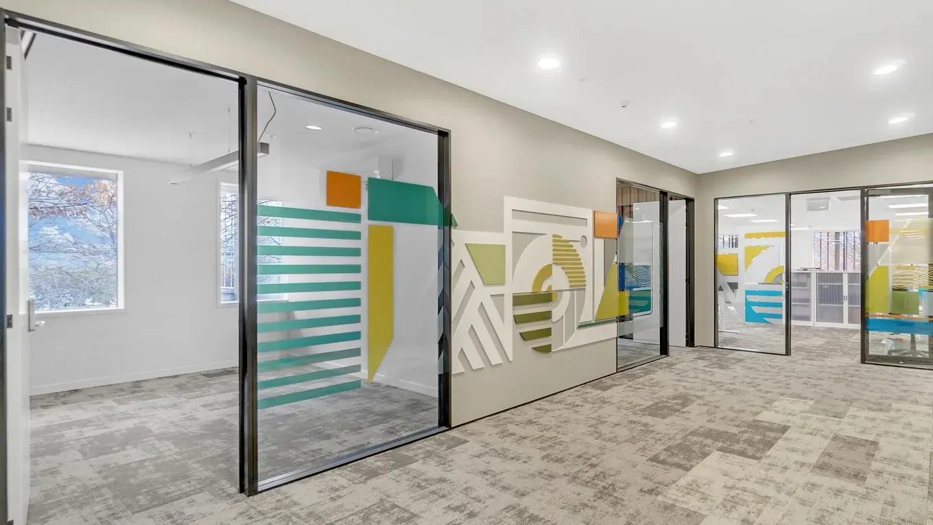 Bold window and wall graphics for office space