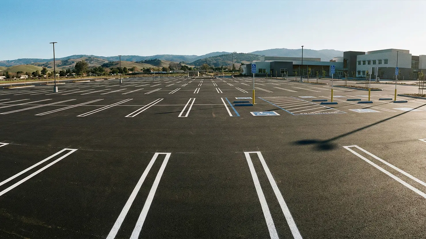 Wide view of car park line marketing for supermarkets in New Zealand