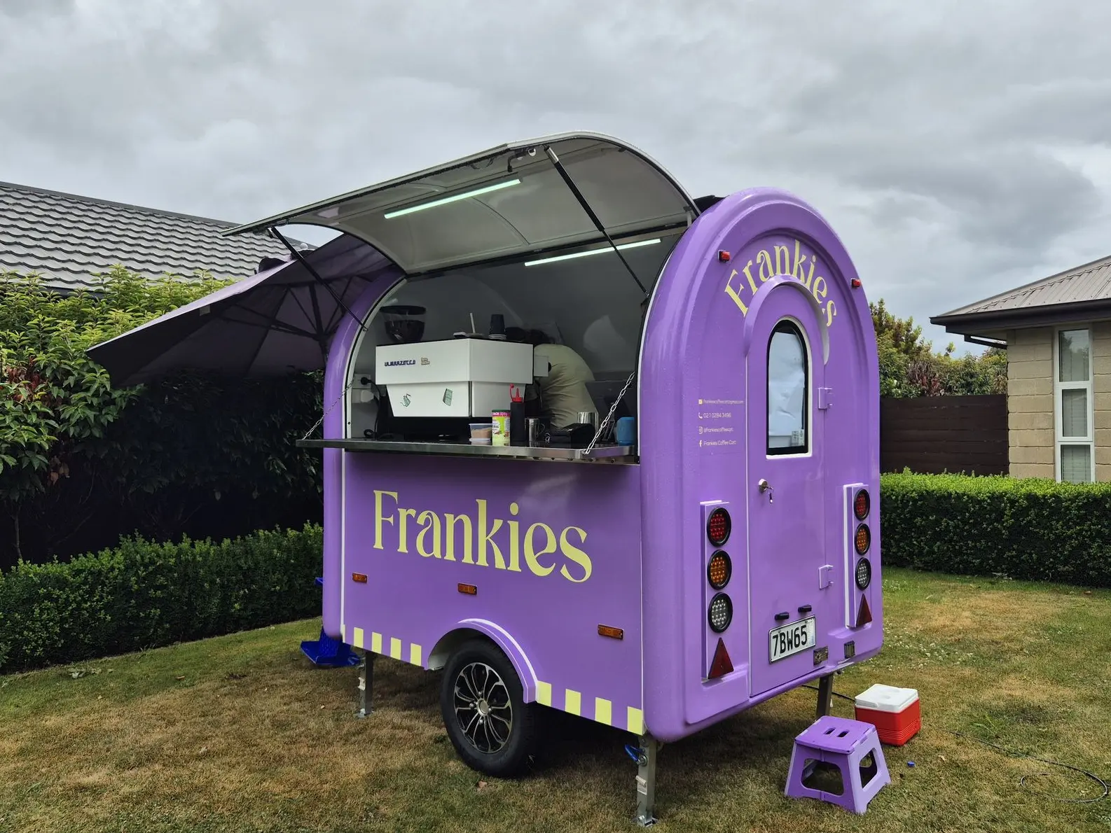 Image shows recent food cart signage project by Displayworks for Frankies Coffee Cart, a full trailer wrap graphic.