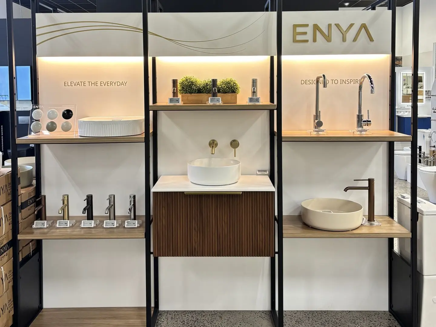 A multi-tier, custom display stand for Enya bathrooms shop fitout, designed, fabricated and installed by Displayworks.